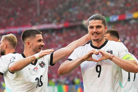 Marcel Sabitzer celebrates after scoring his side's third goal 